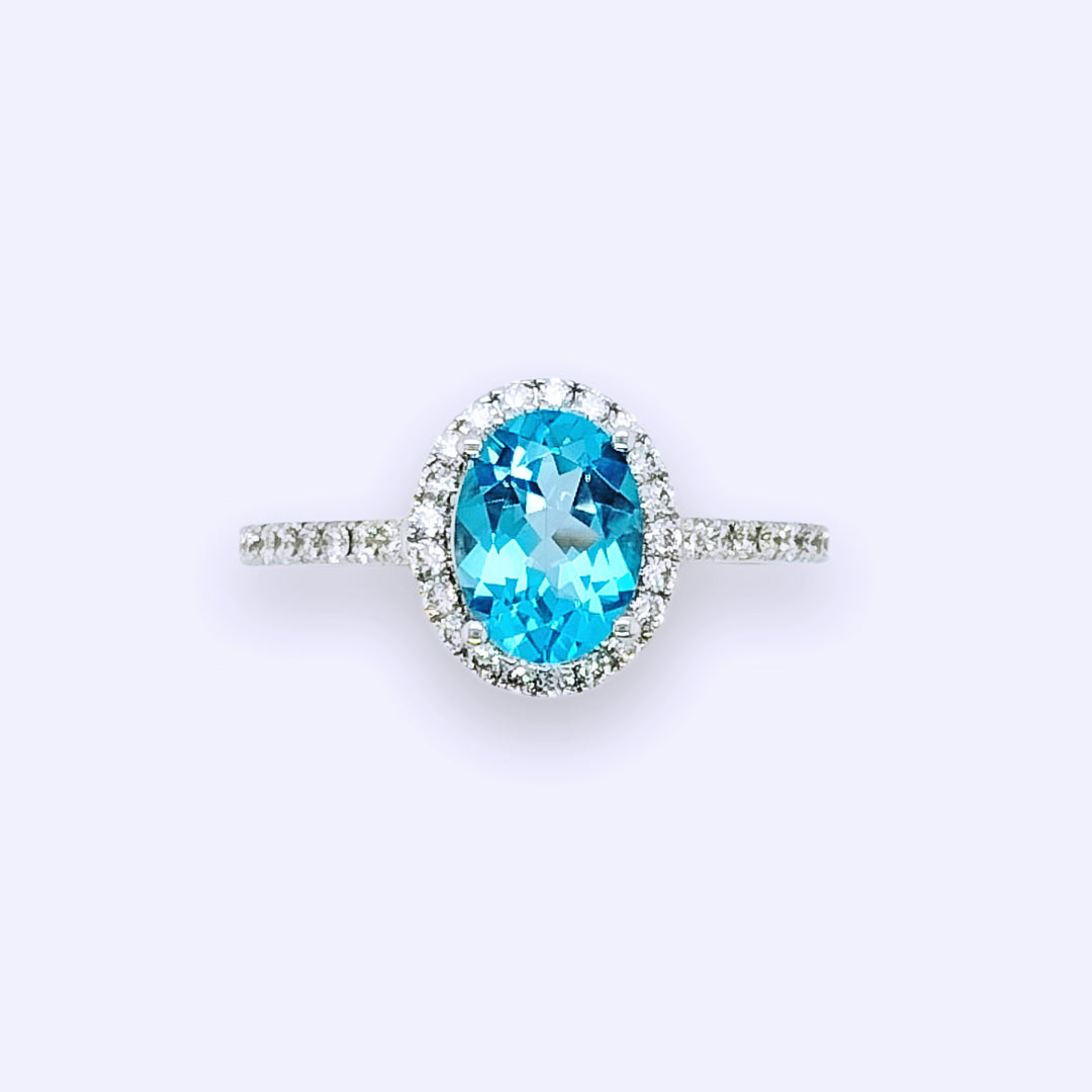 Oval Blue Topaz Diamond Halo Ring