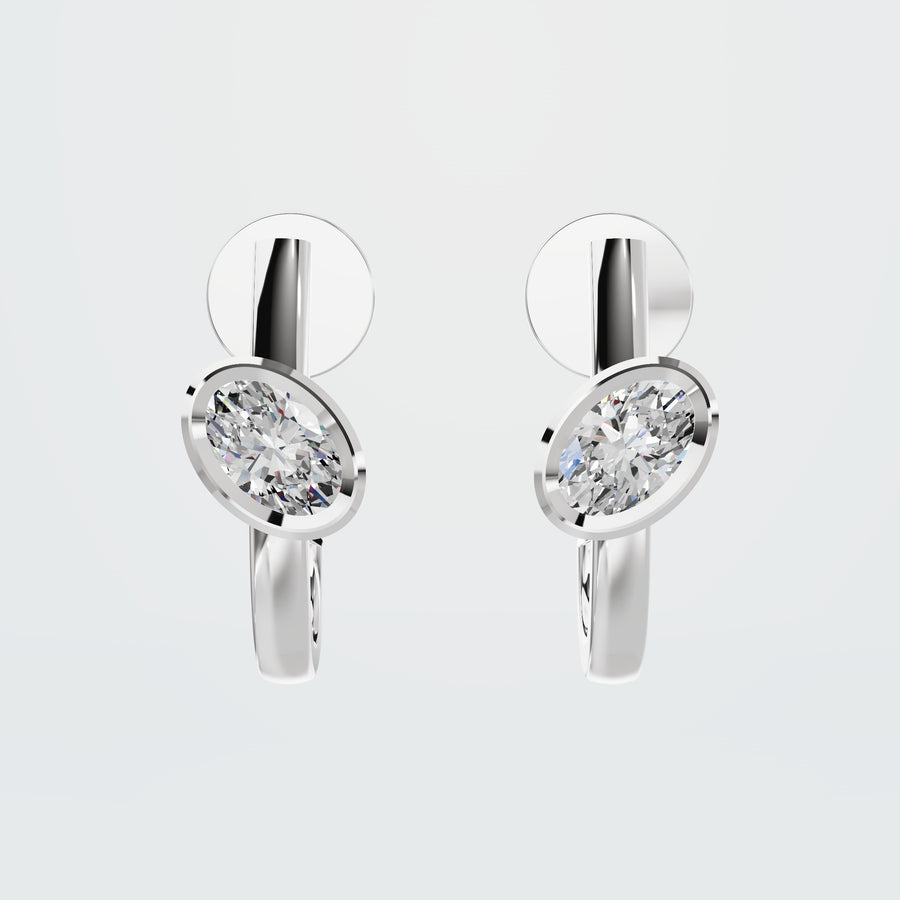 Oval Mini Diamond Huggies in white gold