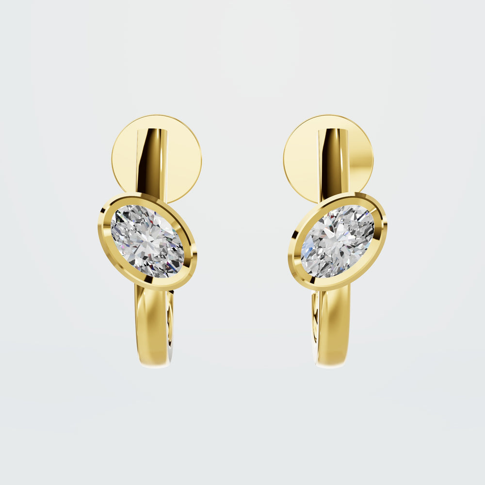 Oval Mini Diamond Huggies in yellow gold