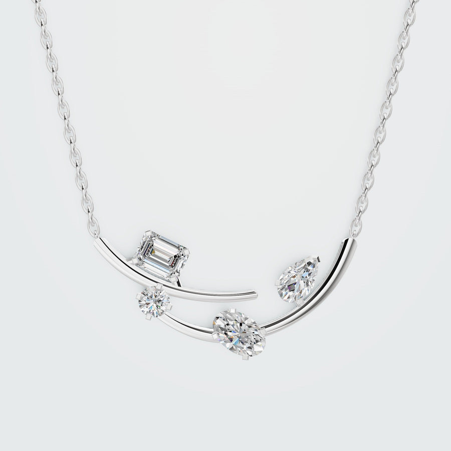 Emerald station necklace in white gold