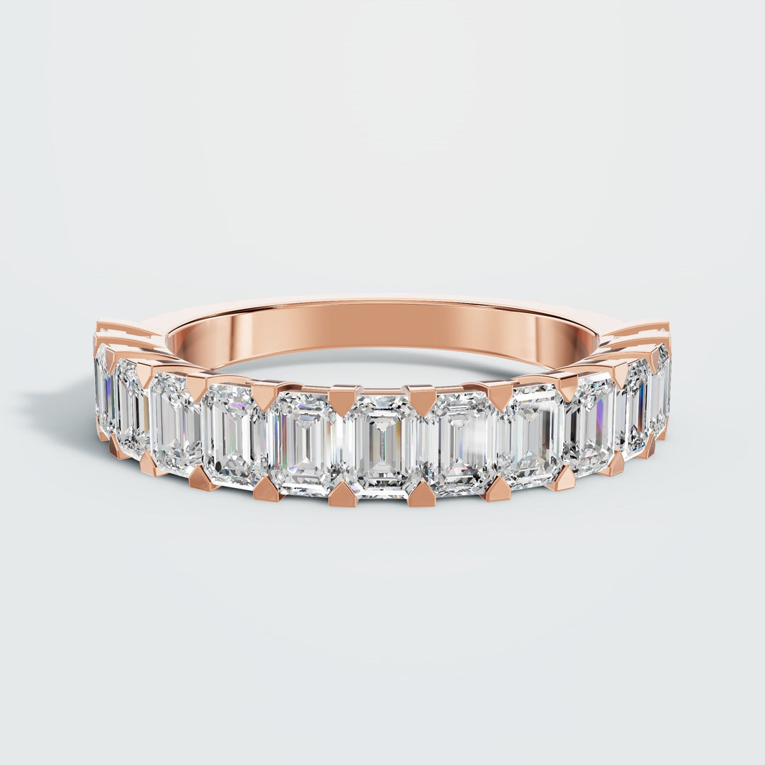 half emerald eternity band