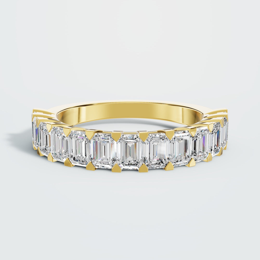 half emerald eternity band